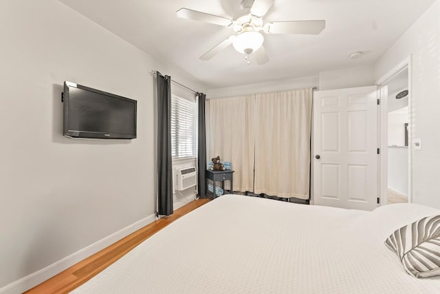 40 Halili Ln Unit 4D, Kihei, HI 96753 - bedroom with light wood-style floors and ceiling fan