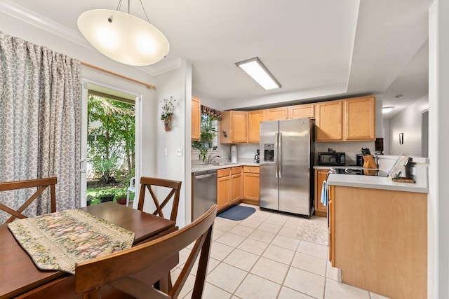 40 Halili Ln Unit 4D, Kihei, HI 96753 - kitchen featuring appliances with stainless steel finishes, light countertops, light tile patterned floors, light brown cabinets, and ornamental molding