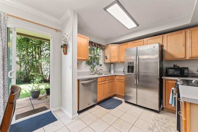 40 Halili Ln Unit 4D, Kihei, HI 96753 - kitchen with stainless steel appliances, light countertops, healthy amount of natural light, light tile patterned flooring, and ornamental molding