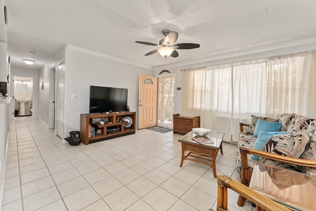 40 Halili Ln Unit 4D, Kihei, HI 96753 - living room with light tile patterned floors, ceiling fan, and ornamental molding