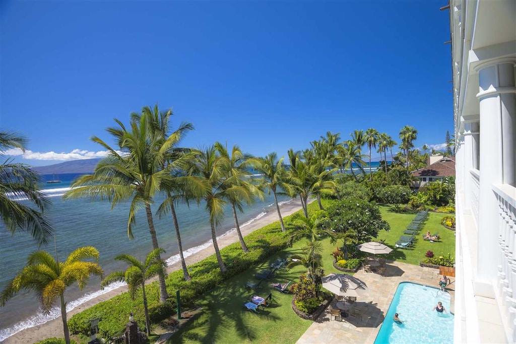 property view of water featuring a beach view