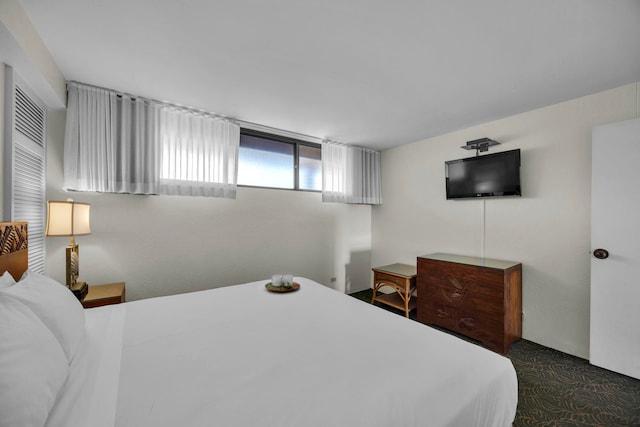 bedroom featuring carpet flooring