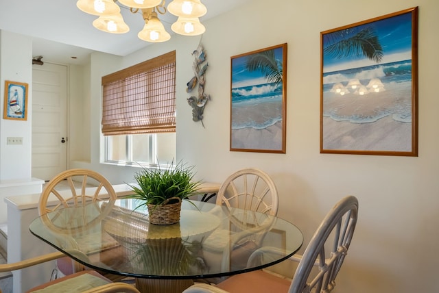 dining area with a notable chandelier