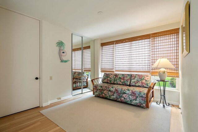 living area with light hardwood / wood-style floors