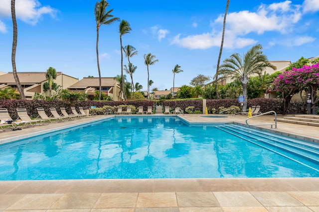 view of swimming pool featuring a patio