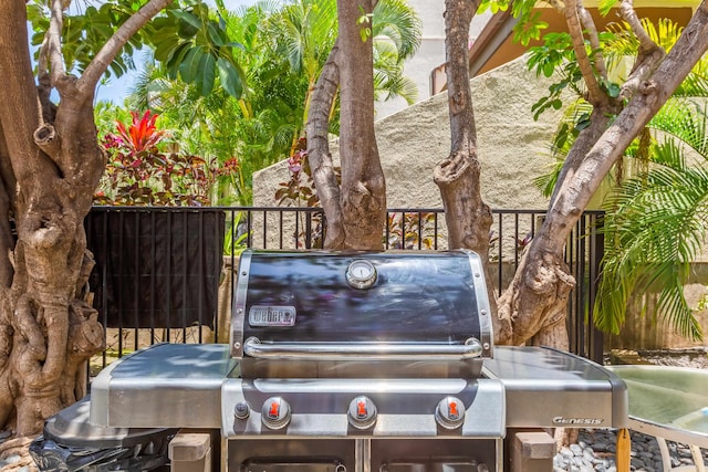 view of patio featuring a grill