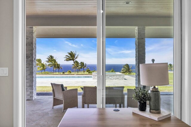 500 Kai Huki Cir Unit B, Haiku, HI 96708 - dining room with wooden ceiling, concrete floors, and a water view