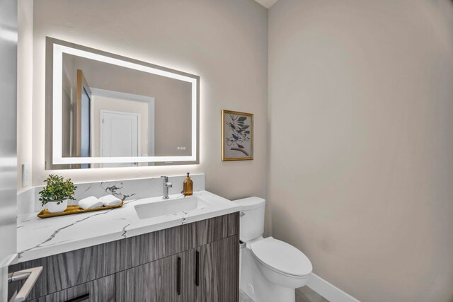 500 Kai Huki Cir Unit B, Haiku, HI 96708 - bathroom with toilet, vanity, and baseboards