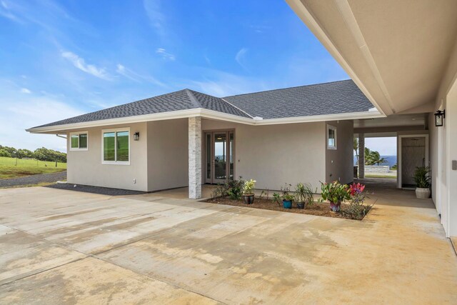 500 Kai Huki Cir Unit B, Haiku, HI 96708 - back of house featuring stucco siding and a shingled roof