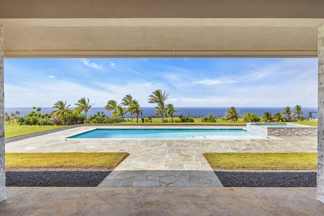 500 Kai Huki Cir Unit B, Haiku, HI 96708 - view of pool featuring a patio area, a pool with connected hot tub, and a water view