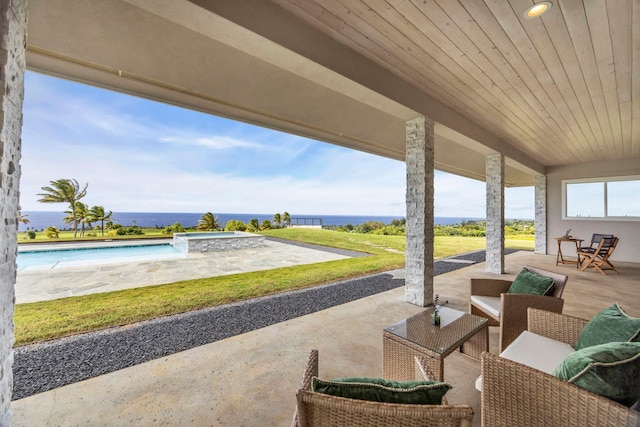 500 Kai Huki Cir Unit B, Haiku, HI 96708 - view of patio featuring an outdoor pool, a water view, and an in-ground hot tub