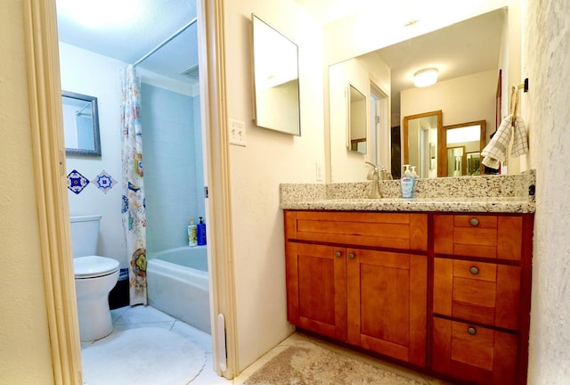 full bathroom with tile patterned floors, vanity, shower / bath combination with curtain, and toilet