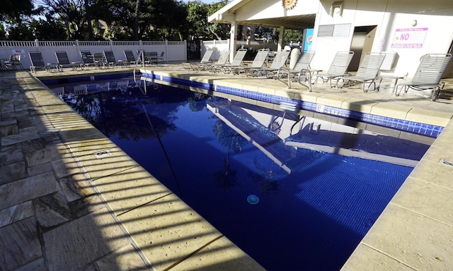 view of swimming pool featuring a patio