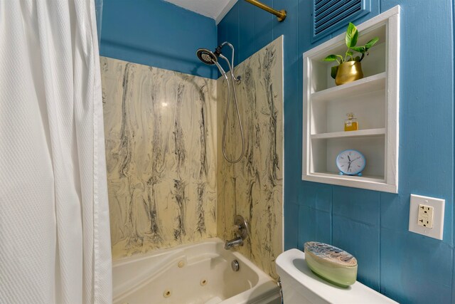 bathroom with a combined bath / shower with jetted tub and toilet