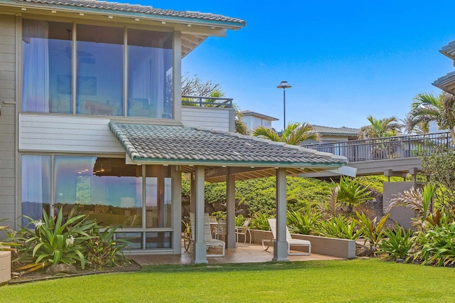 exterior space featuring a sunroom