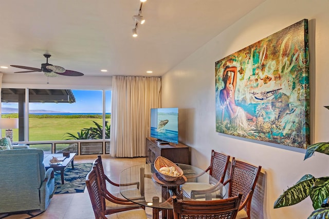 dining space featuring recessed lighting, ceiling fan, rail lighting, and tile patterned flooring