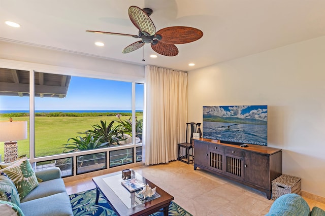 living room featuring recessed lighting and a ceiling fan