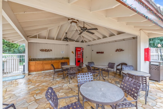 view of patio featuring ceiling fan