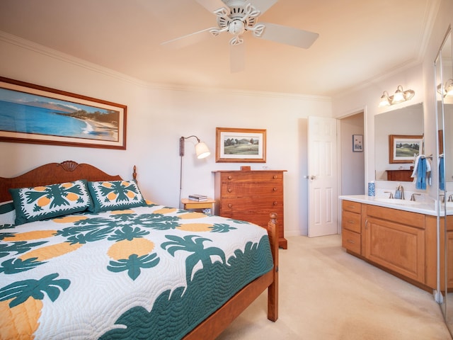 bedroom featuring ceiling fan, ornamental molding, light colored carpet, and sink