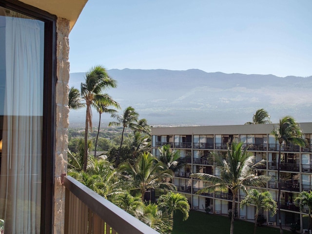 balcony featuring a mountain view