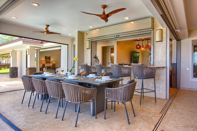 dining space with ceiling fan