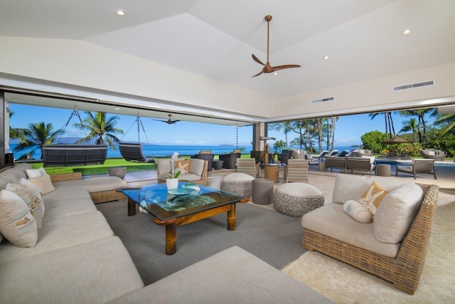 view of patio / terrace featuring ceiling fan, outdoor lounge area, and a water view