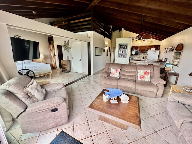 tiled living room featuring vaulted ceiling and ceiling fan