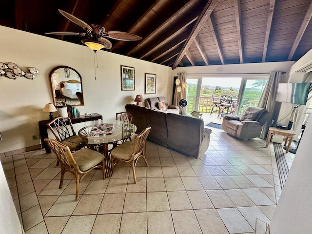 tiled dining space with wood ceiling, ceiling fan, and vaulted ceiling with beams