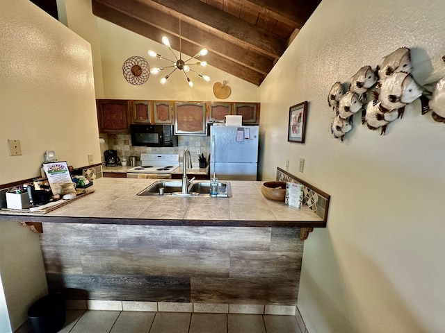 kitchen featuring sink, wood ceiling, white appliances, tile counters, and beamed ceiling