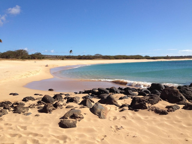 view of water feature with a view of the beach