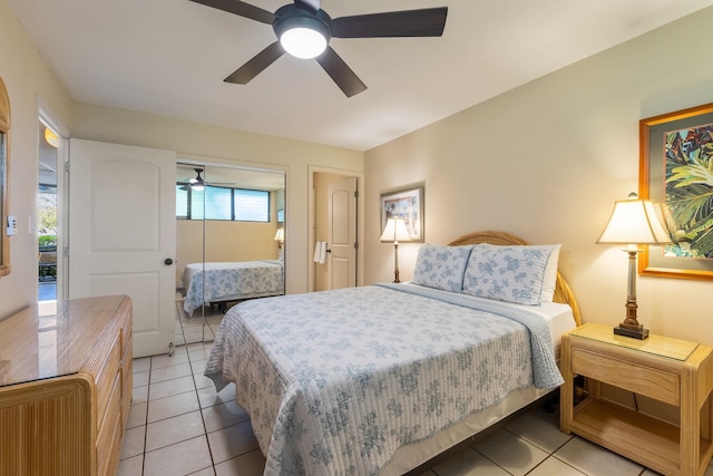 tiled bedroom with ceiling fan