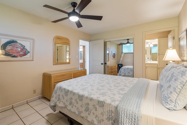2653 S Kihei Rd Unit 114, Kihei, HI 96753 - bedroom featuring light tile patterned floors, ensuite bath, a closet, and a ceiling fan