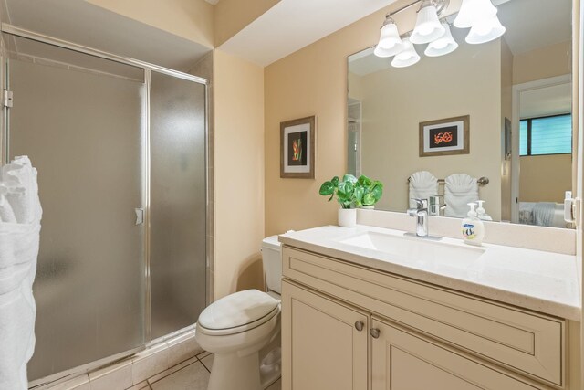 2653 S Kihei Rd Unit 114, Kihei, HI 96753 - full bath with vanity, tile patterned floors, a shower stall, and a chandelier