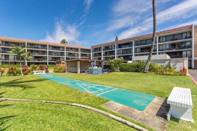 2653 S Kihei Rd Unit 114, Kihei, HI 96753 - view of home's community featuring a lawn and shuffleboard