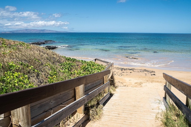 view of water feature with a beach view