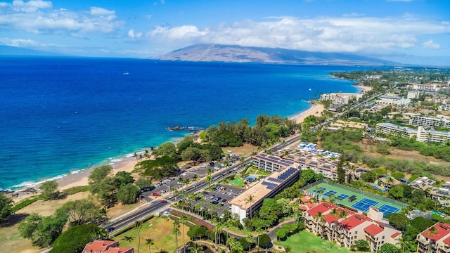 bird's eye view featuring a view of the beach and a water view