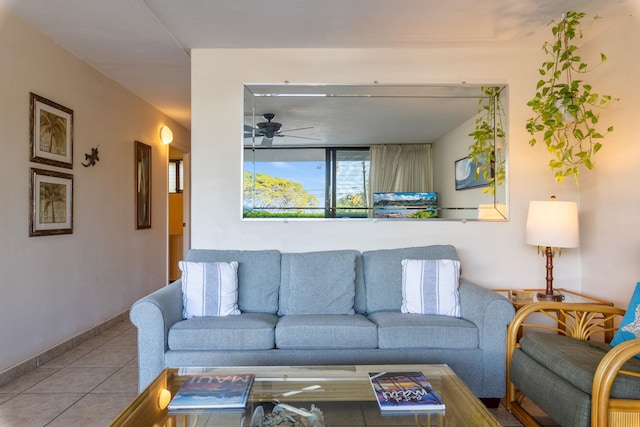 tiled living room featuring ceiling fan