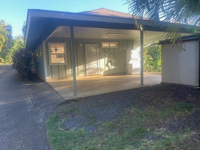 exterior space featuring a carport