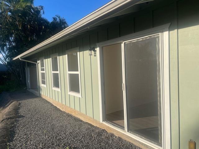 view of side of property with board and batten siding