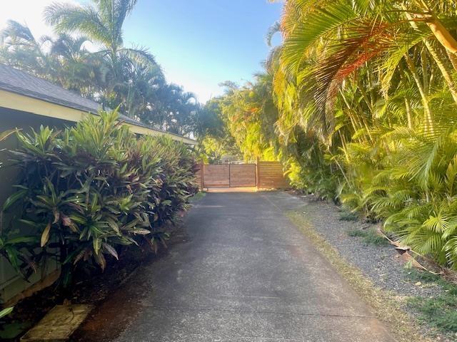 view of street with aphalt driveway