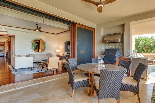 dining room featuring visible vents and a ceiling fan