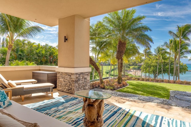 view of patio featuring a water view and an outdoor hangout area