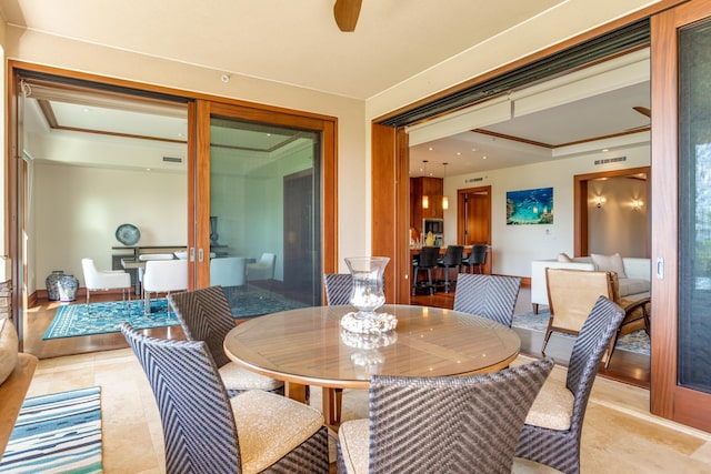 dining room featuring visible vents and ceiling fan