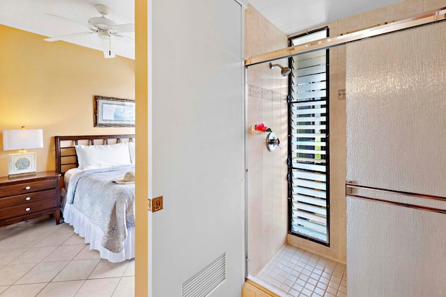 bathroom featuring tile patterned floors and ceiling fan