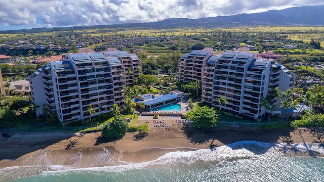 bird's eye view with a beach view and a water view