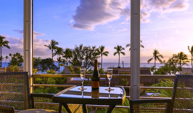 2385 S Kihei Rd Unit 306, Kihei, HI 96753 - balcony at dusk featuring a water view