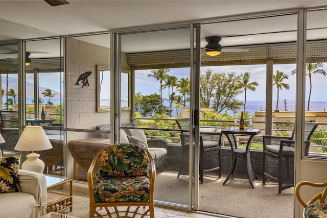 2385 S Kihei Rd Unit 306, Kihei, HI 96753 - sunroom with ceiling fan and a water view