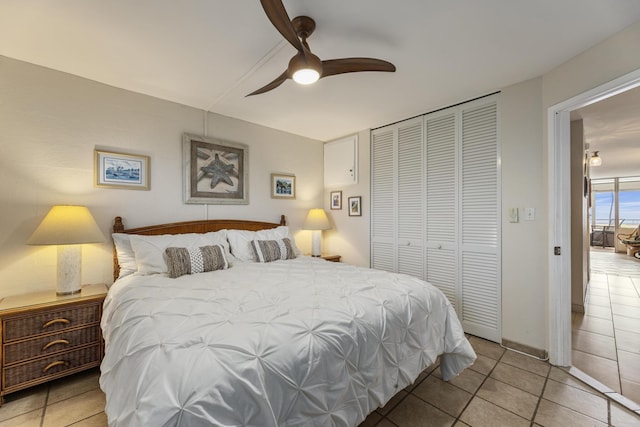 2385 S Kihei Rd Unit 306, Kihei, HI 96753 - bedroom featuring a closet, tile patterned floors, and ceiling fan