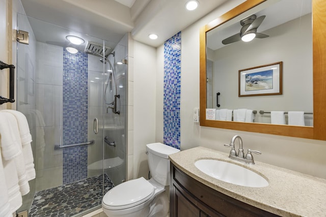 2385 S Kihei Rd Unit 306, Kihei, HI 96753 - full bath featuring a shower stall, toilet, a ceiling fan, vanity, and recessed lighting