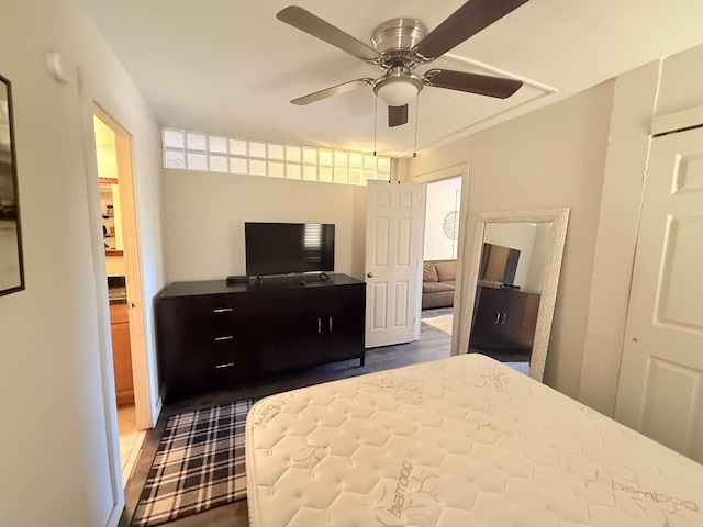 3660 Lower Honoapiilani Rd Unit 111, Lahaina, HI 96761 - bedroom featuring dark wood finished floors and a ceiling fan